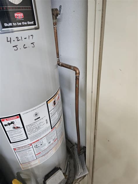 water heater overflow pipe running|Water Leaking from Overflow Pipe on Hot Water Heater: Causes。